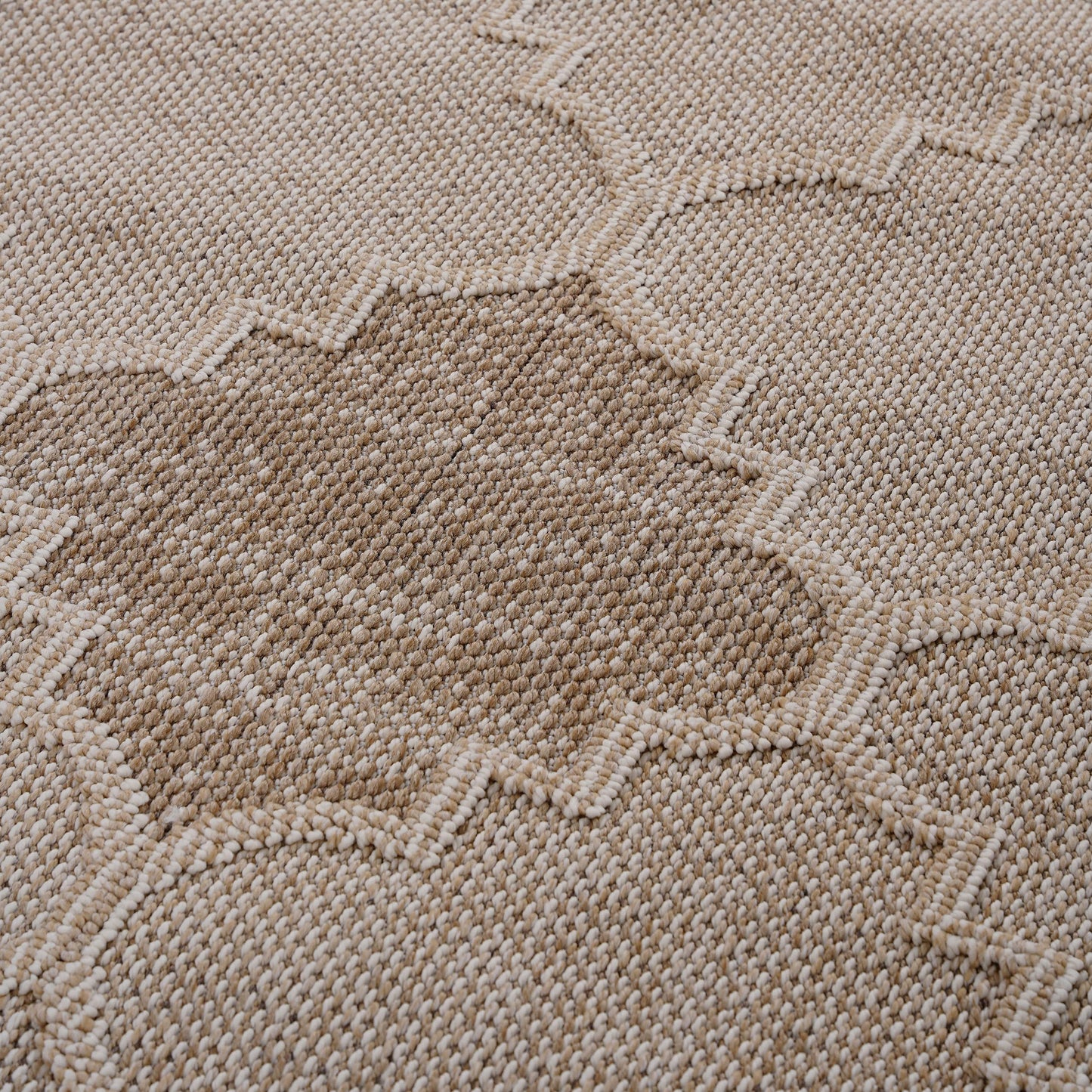 Beige textured rug with abstract woven pattern perfect for modern living rooms