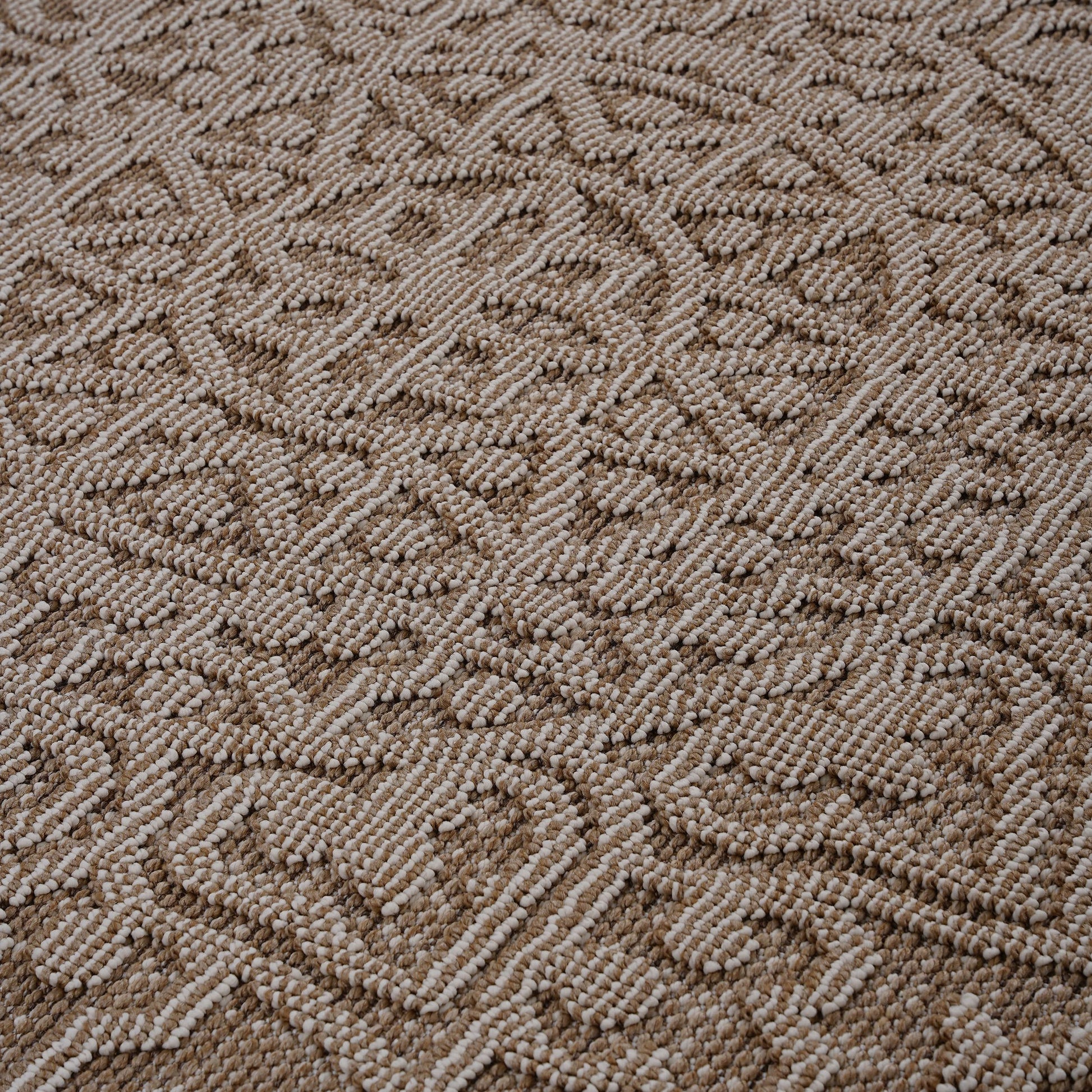 Textured beige area rug with a woven diamond pattern perfect for living rooms