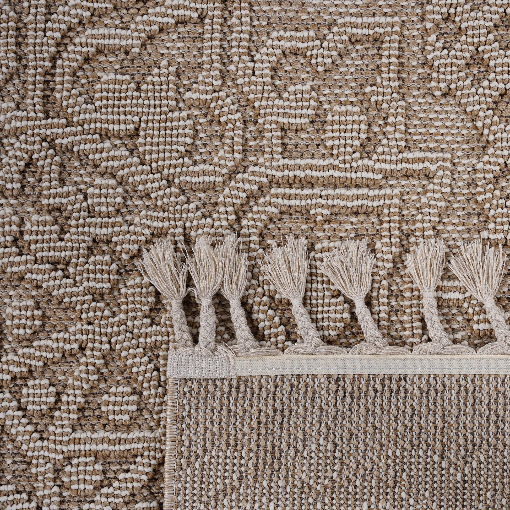 Textured brown and cream abstract pattern rug with braided fringe detail