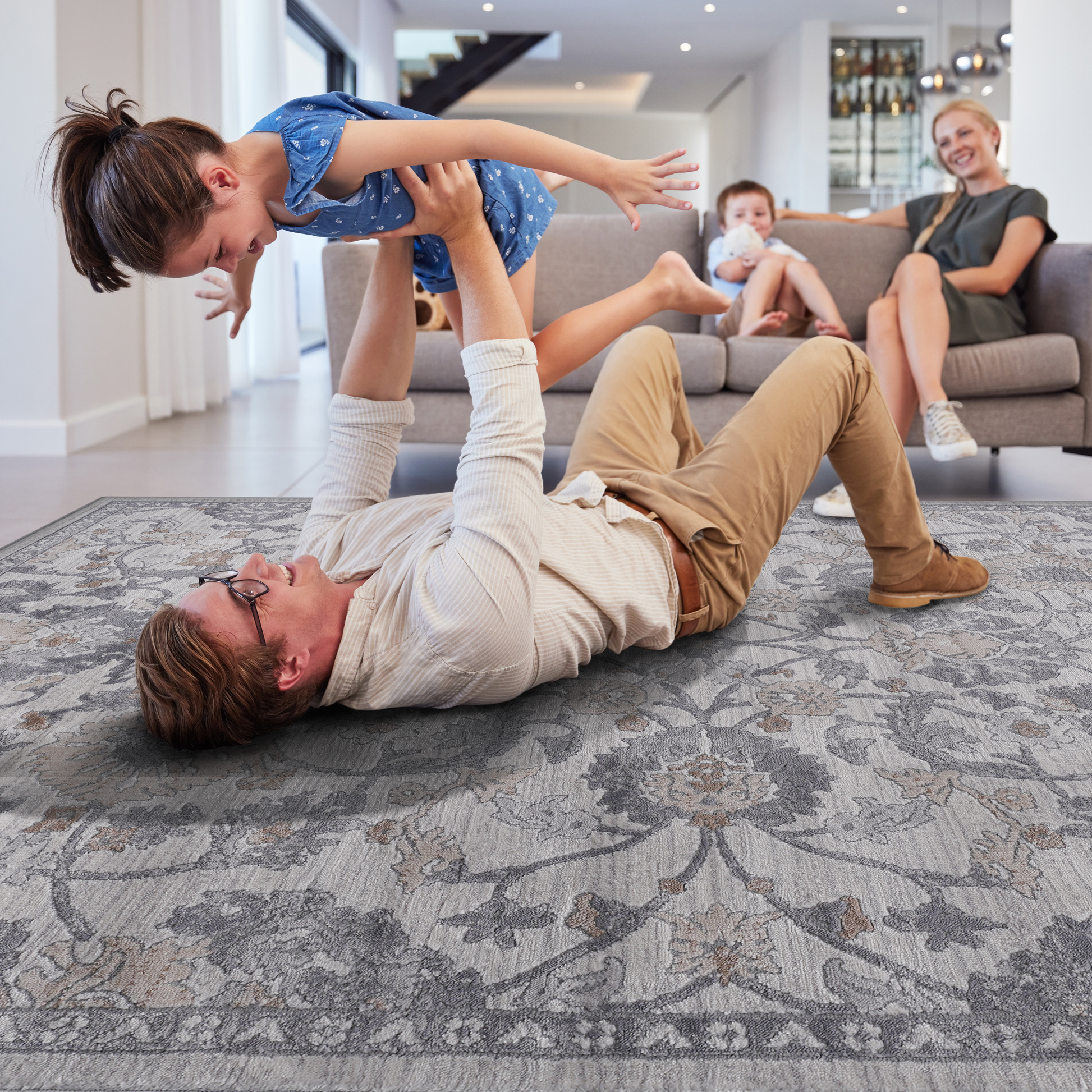Grey and beige Persian rug with intricate floral pattern ideal for living rooms