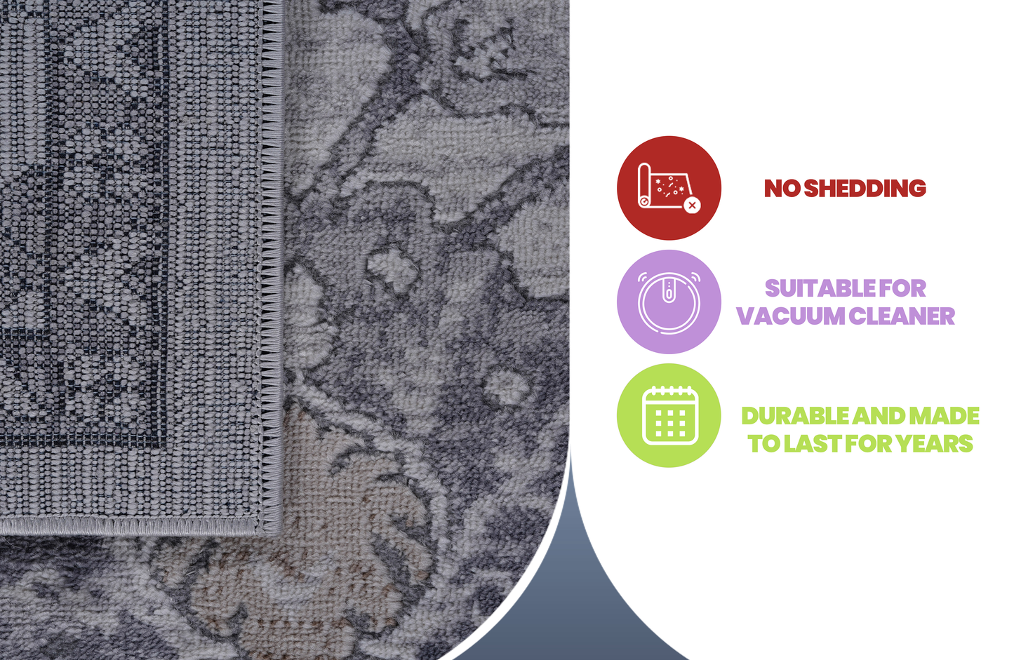 Close up of a gray woven rug with a damask pattern and fringe