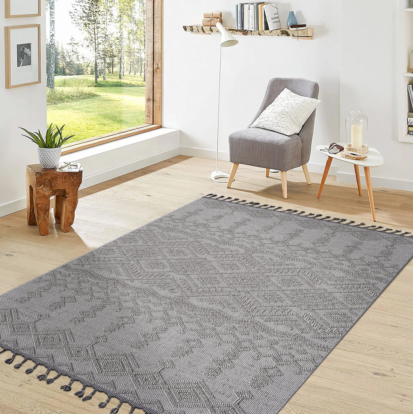 Gray patterned area rug with tassels perfect for living room decor