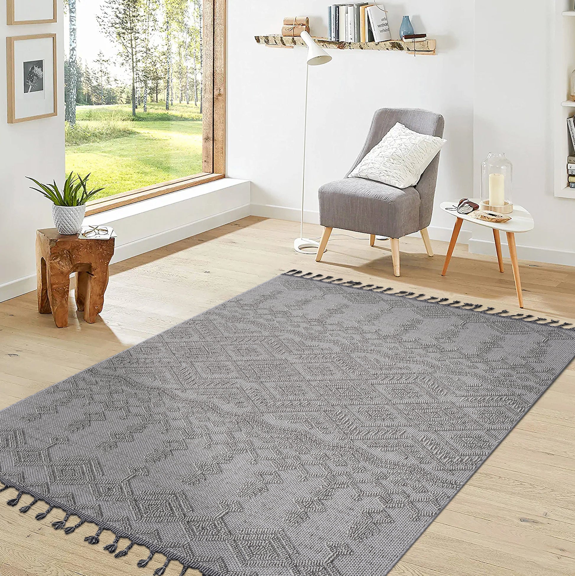 Gray patterned area rug with tassels perfect for living room decor