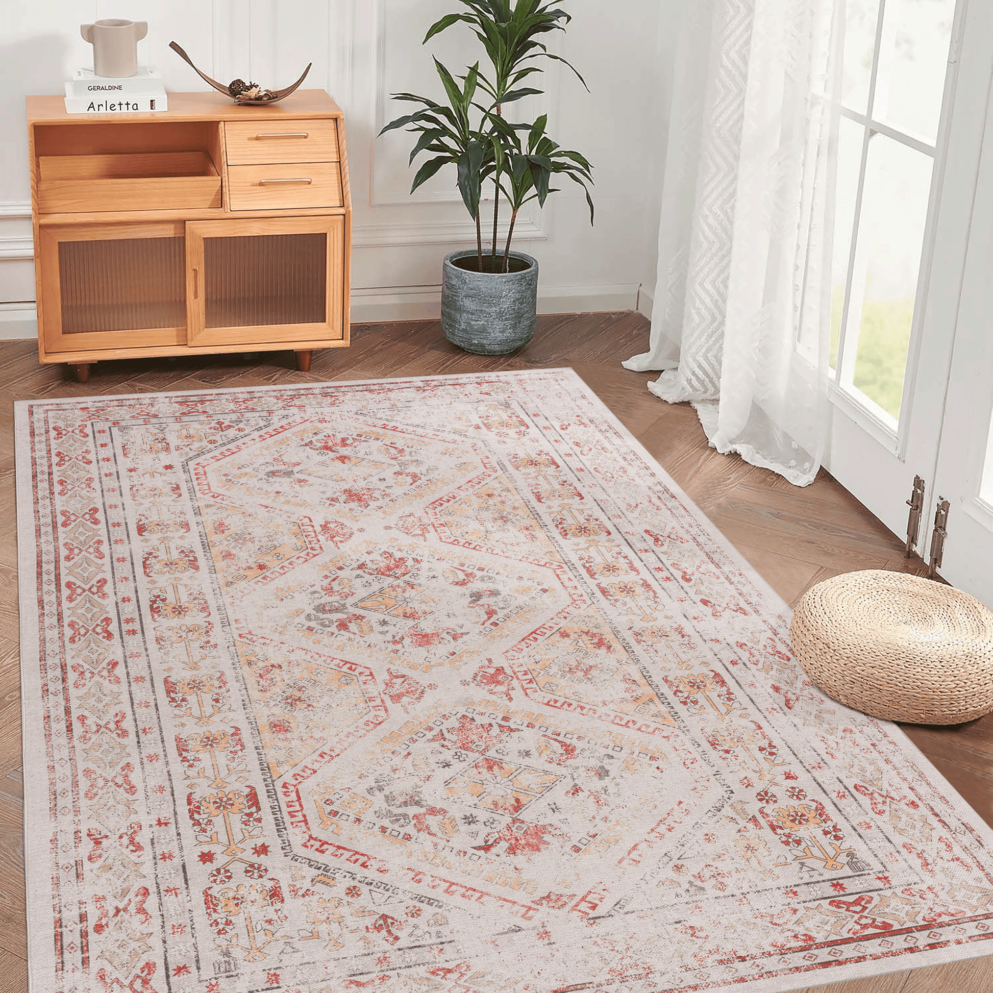Cream oriental rug with red and yellow geometric patterns adds vintage charm to living spaces
