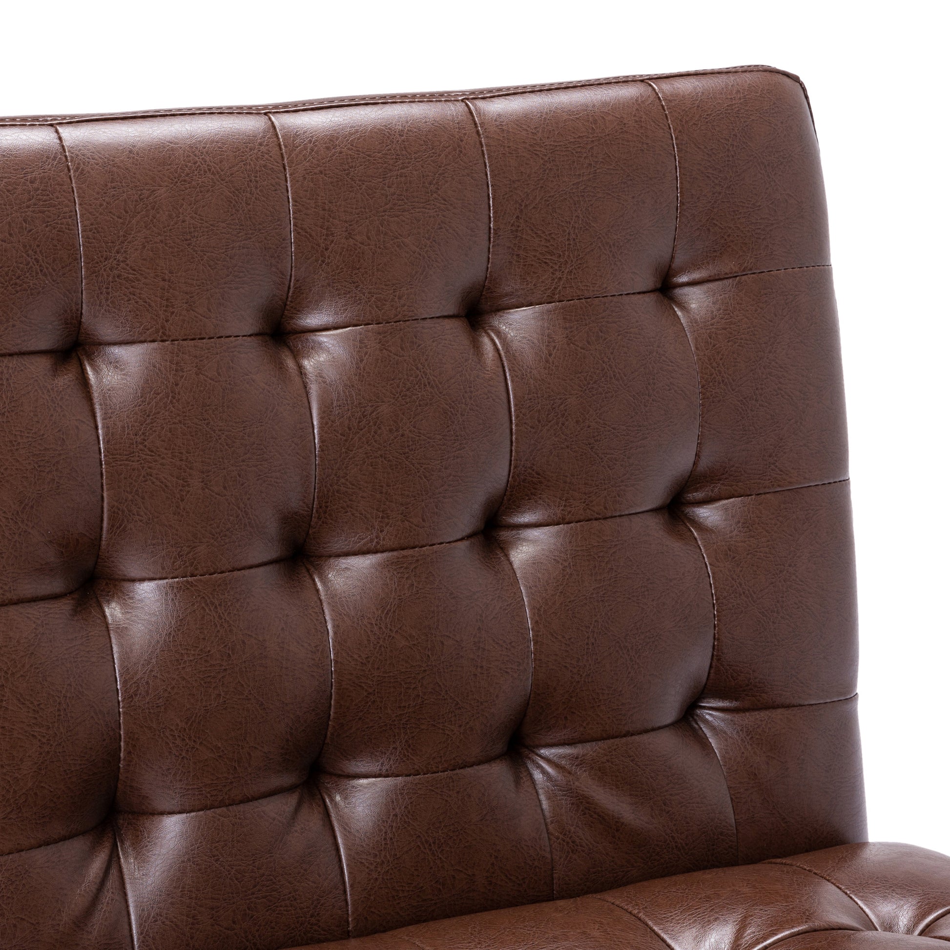 Closeup of tufted brown faux leather chair back with detailed stitching