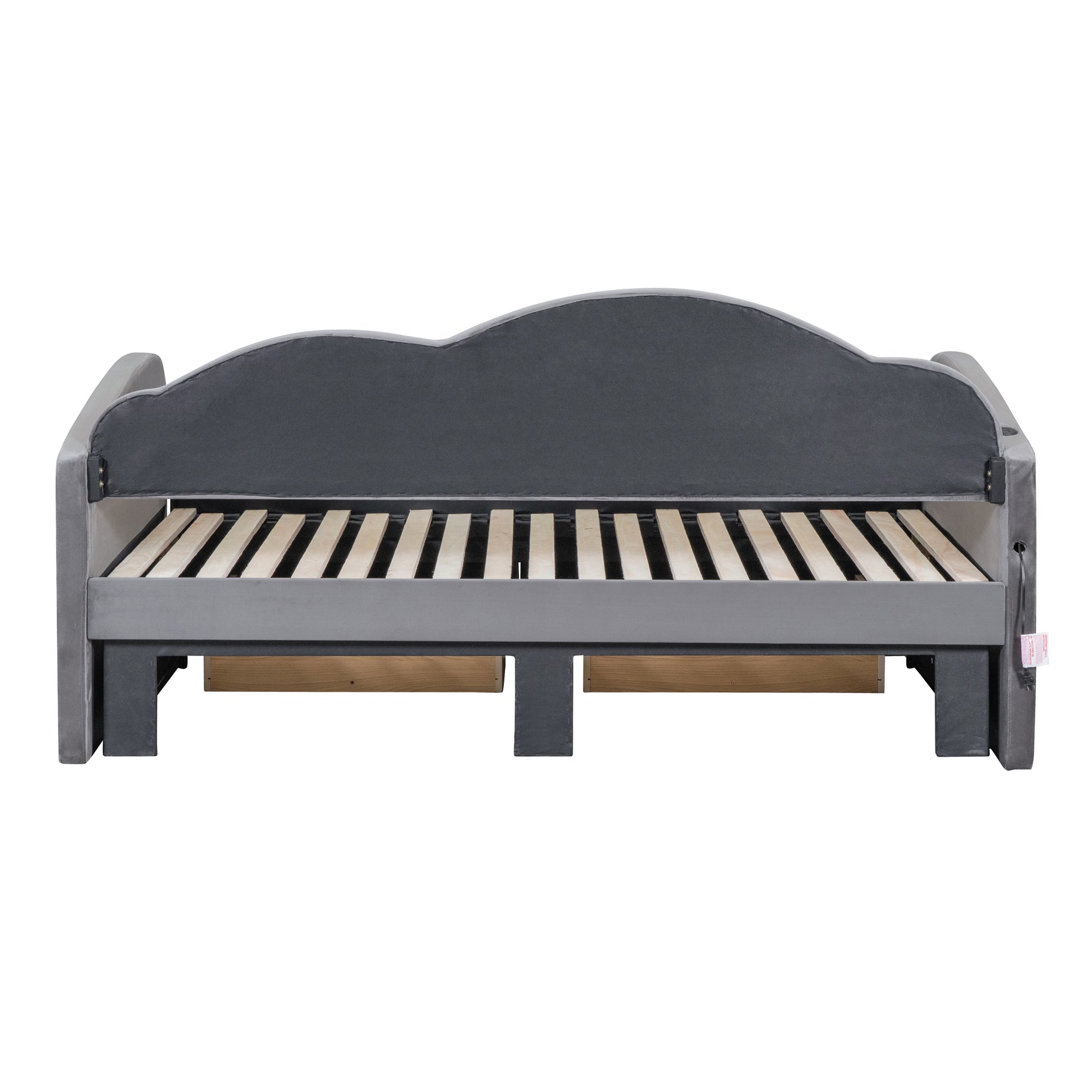 Gray velvet daybed with slatted wood base and storage drawers