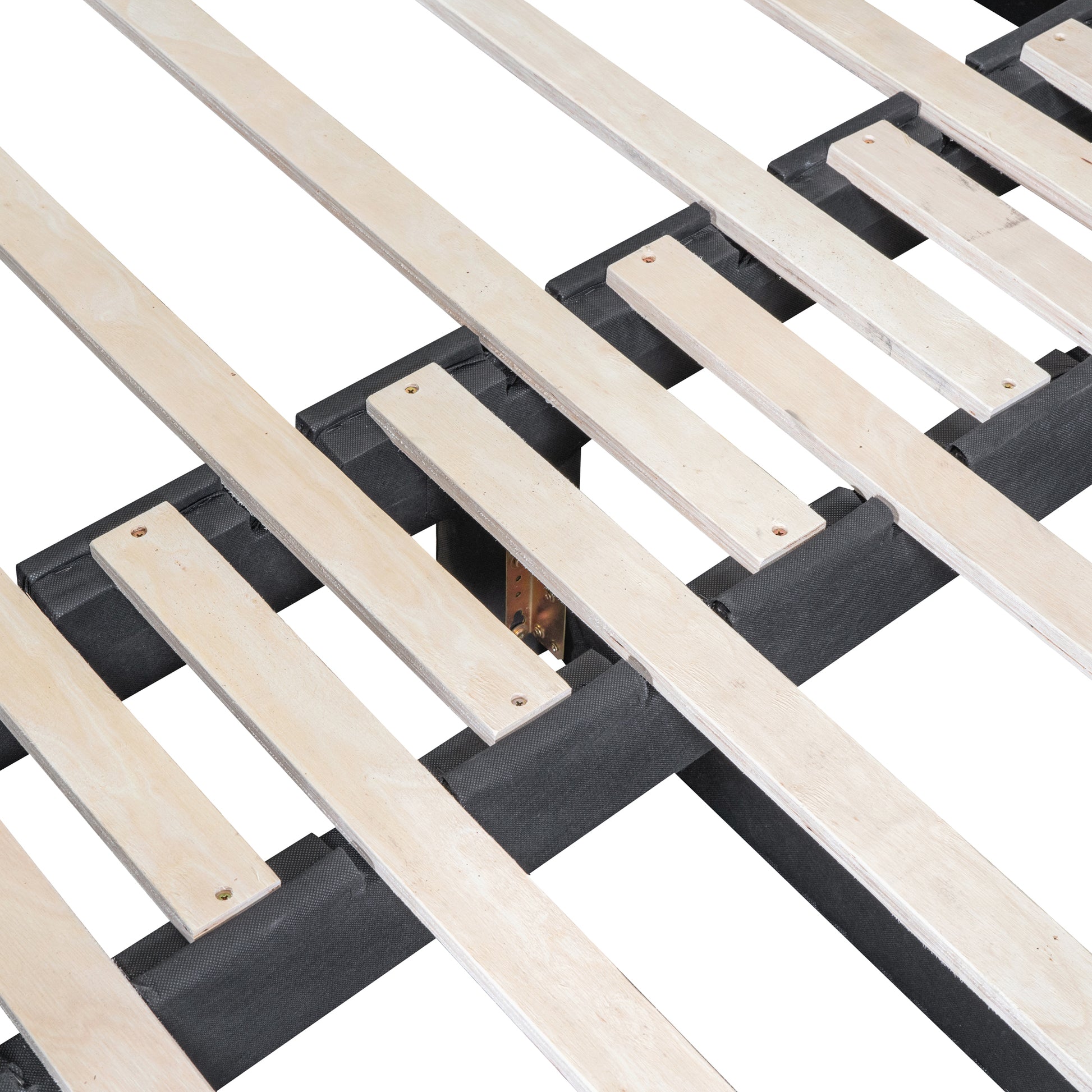 Closeup of wooden bed slats on a black fabric base showing support structure