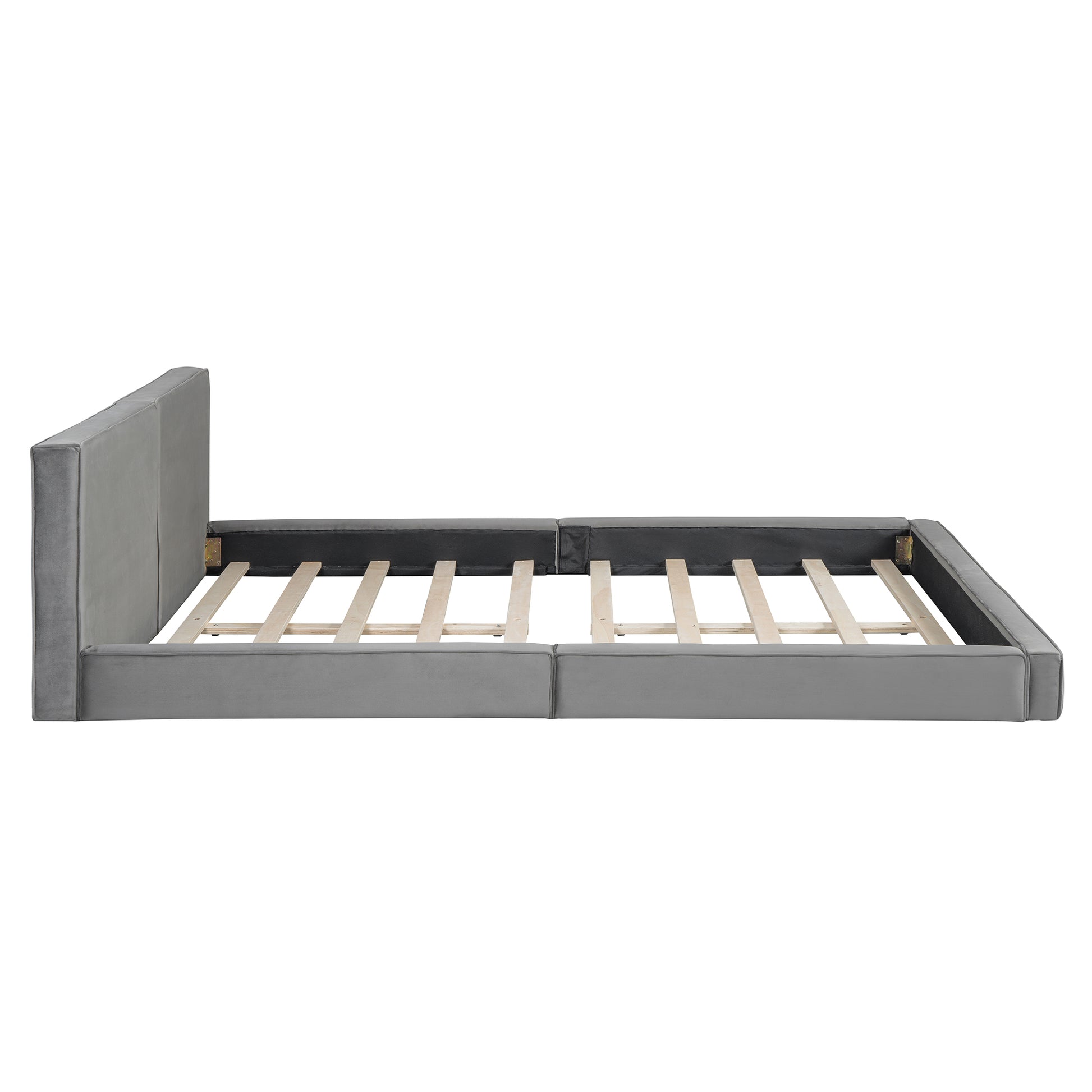 Grey velvet upholstered platform bed frame with wooden slats