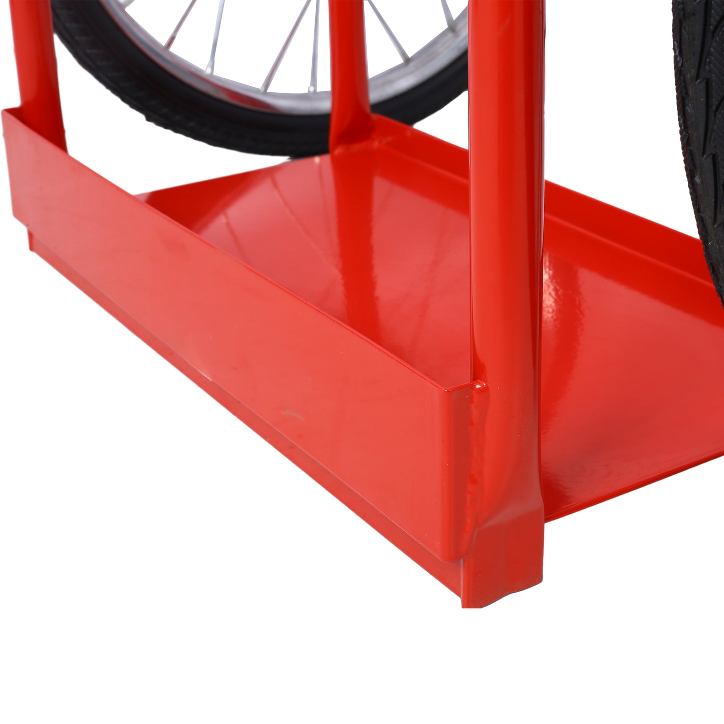 Closeup of a red metal utility cart base with a black tire visible