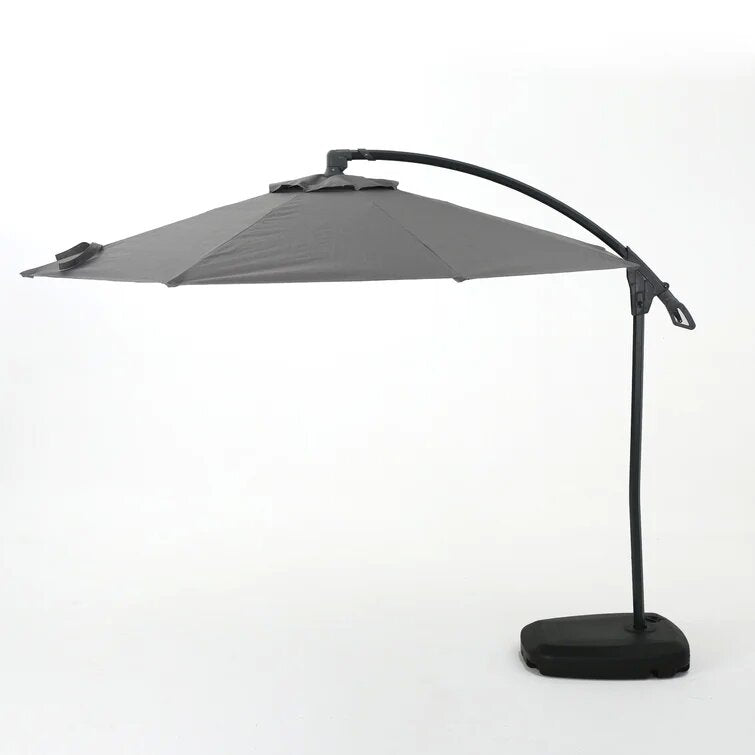 Gray cantilever patio umbrella with sturdy base and curved pole