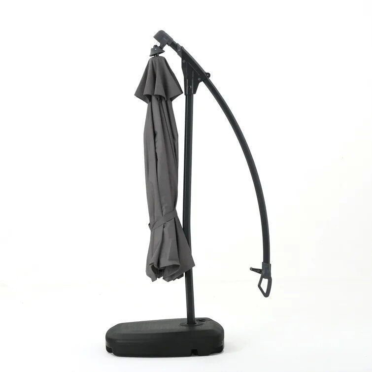 Gray cantilever umbrella on a black base with closed canopy