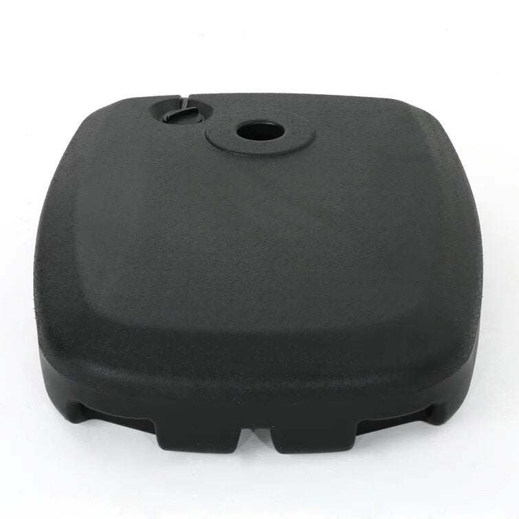 Black plastic patio umbrella base with filling cap and pole holder