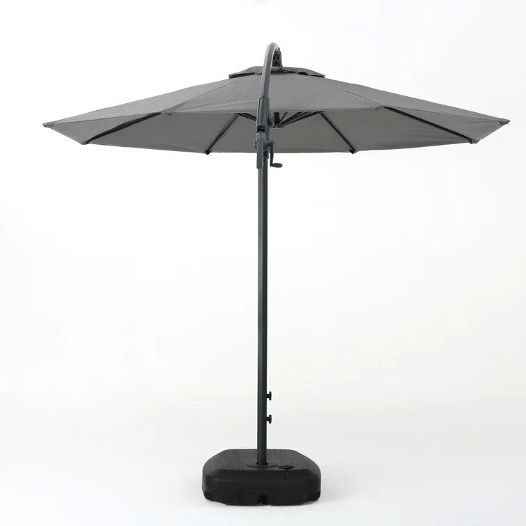Gray patio umbrella with black base ideal for outdoor shading and relaxation