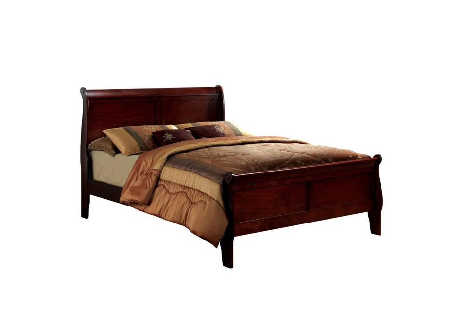 Dark cherry wood sleigh bed with upholstered headboard and coordinating bedding