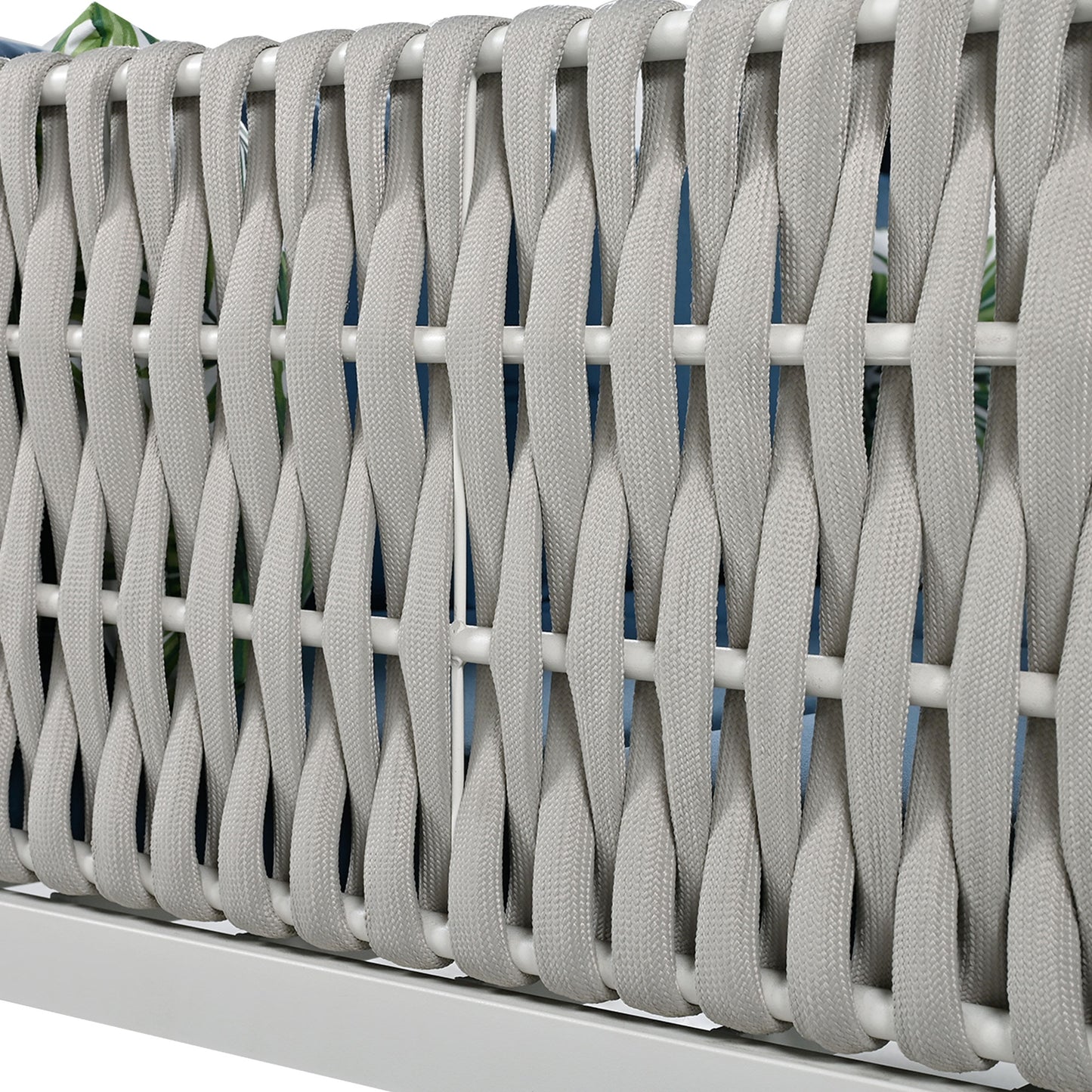 Closeup of grey woven rope detail on a modern outdoor chair