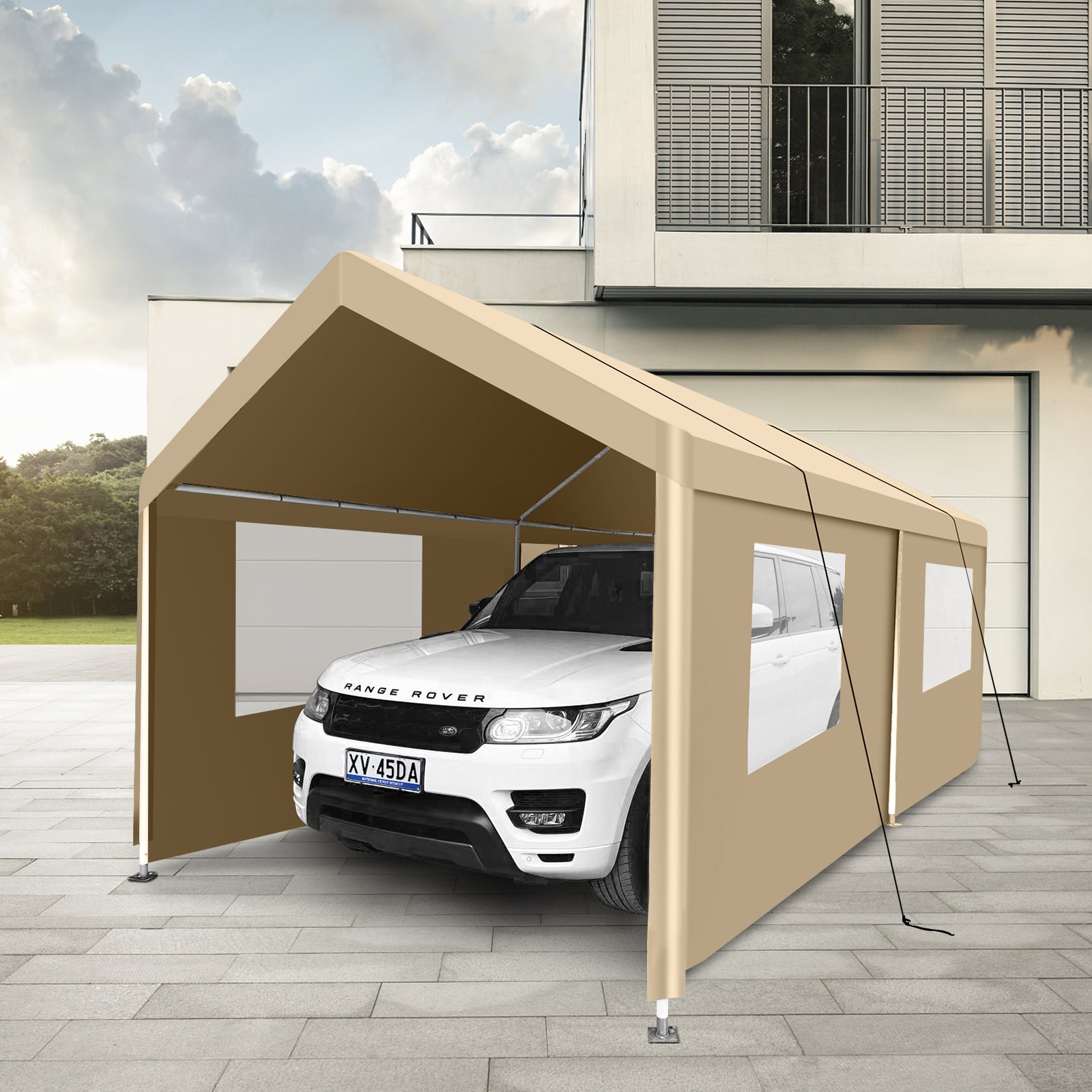 Tan carport tent providing shelter for a white Range Rover in a driveway setting