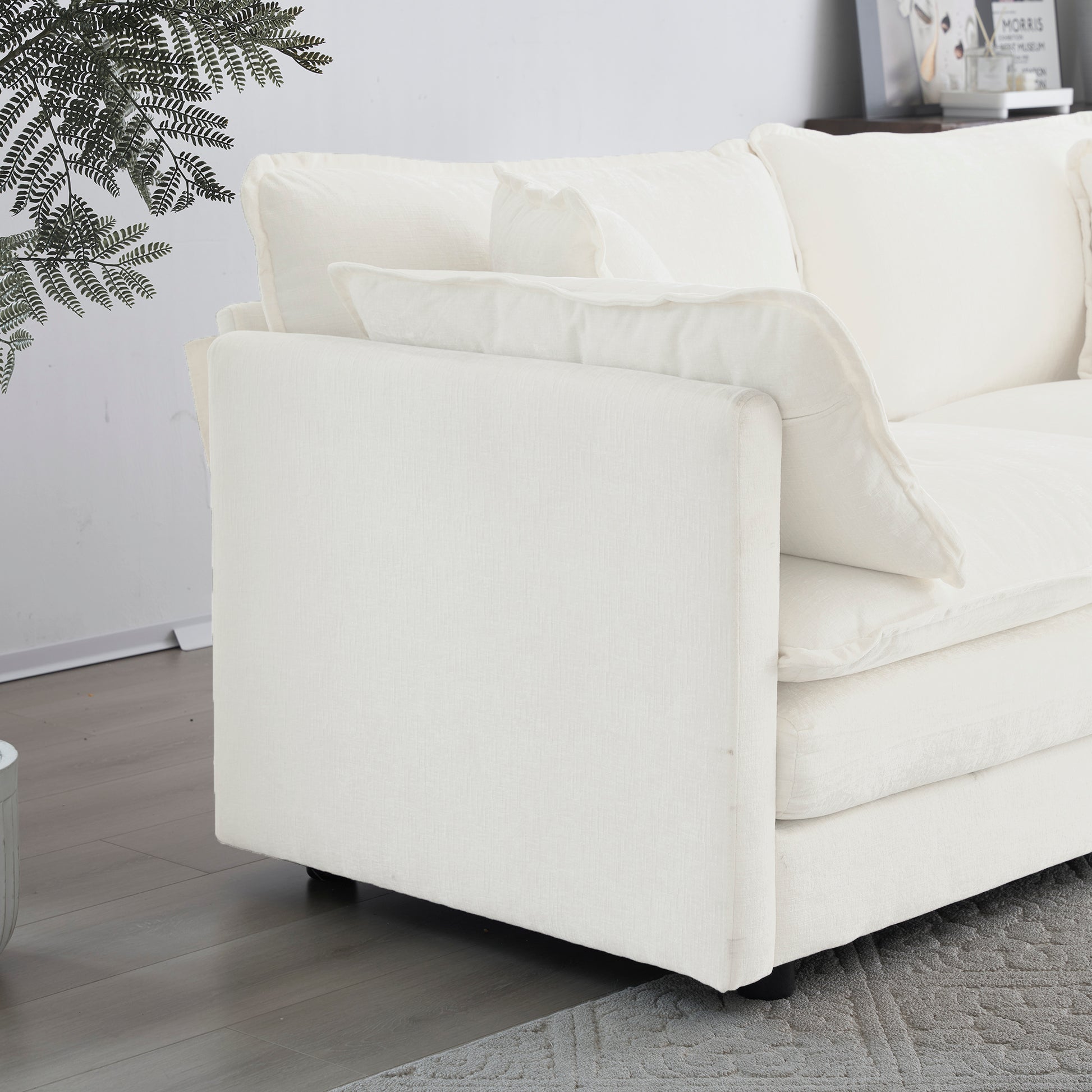 Cream linen sofa with plush cushions and a modern design
