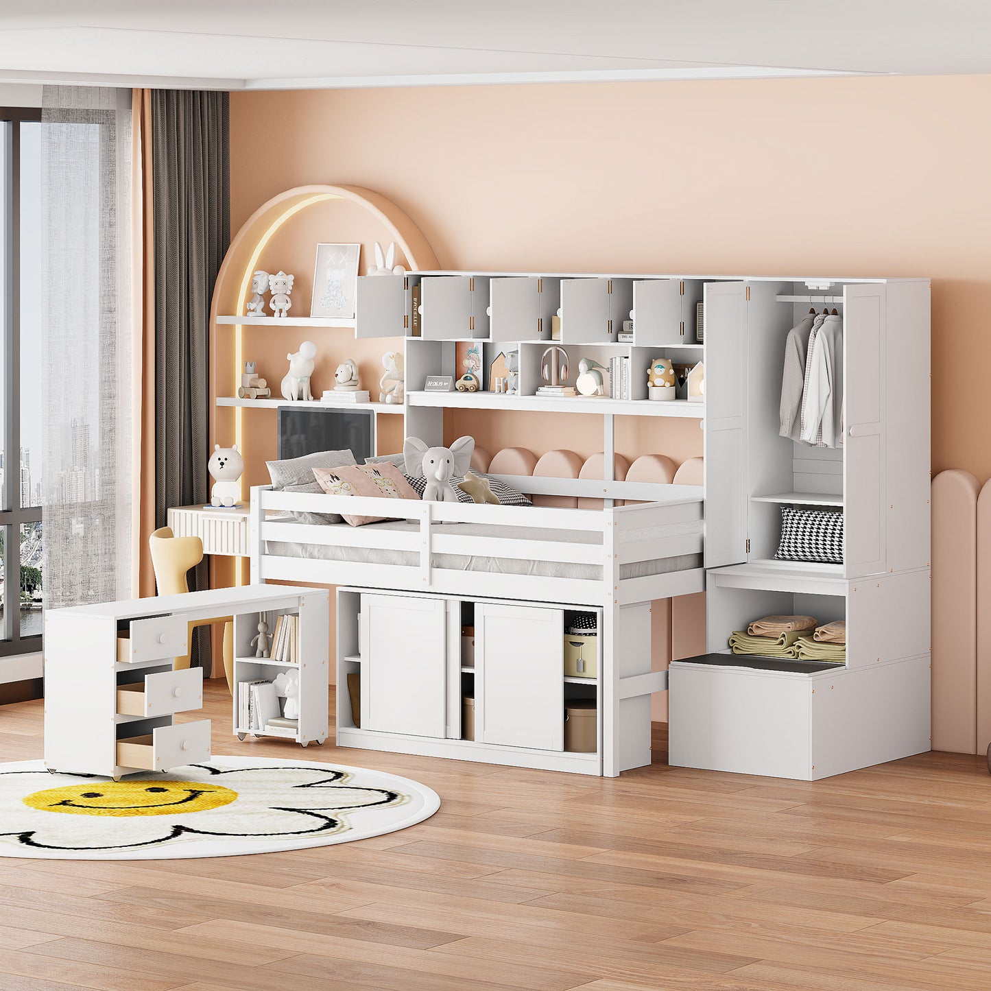 White bunk bed with integrated desk wardrobe and shelving for a childs room