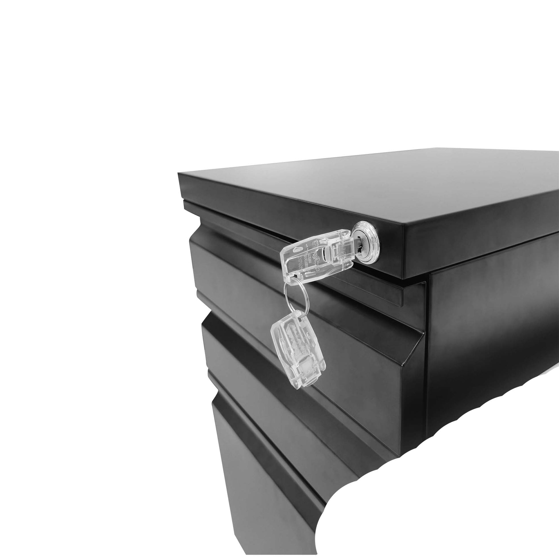 Black metal filing cabinet with two clear plastic keys attached to a keyring in the lock