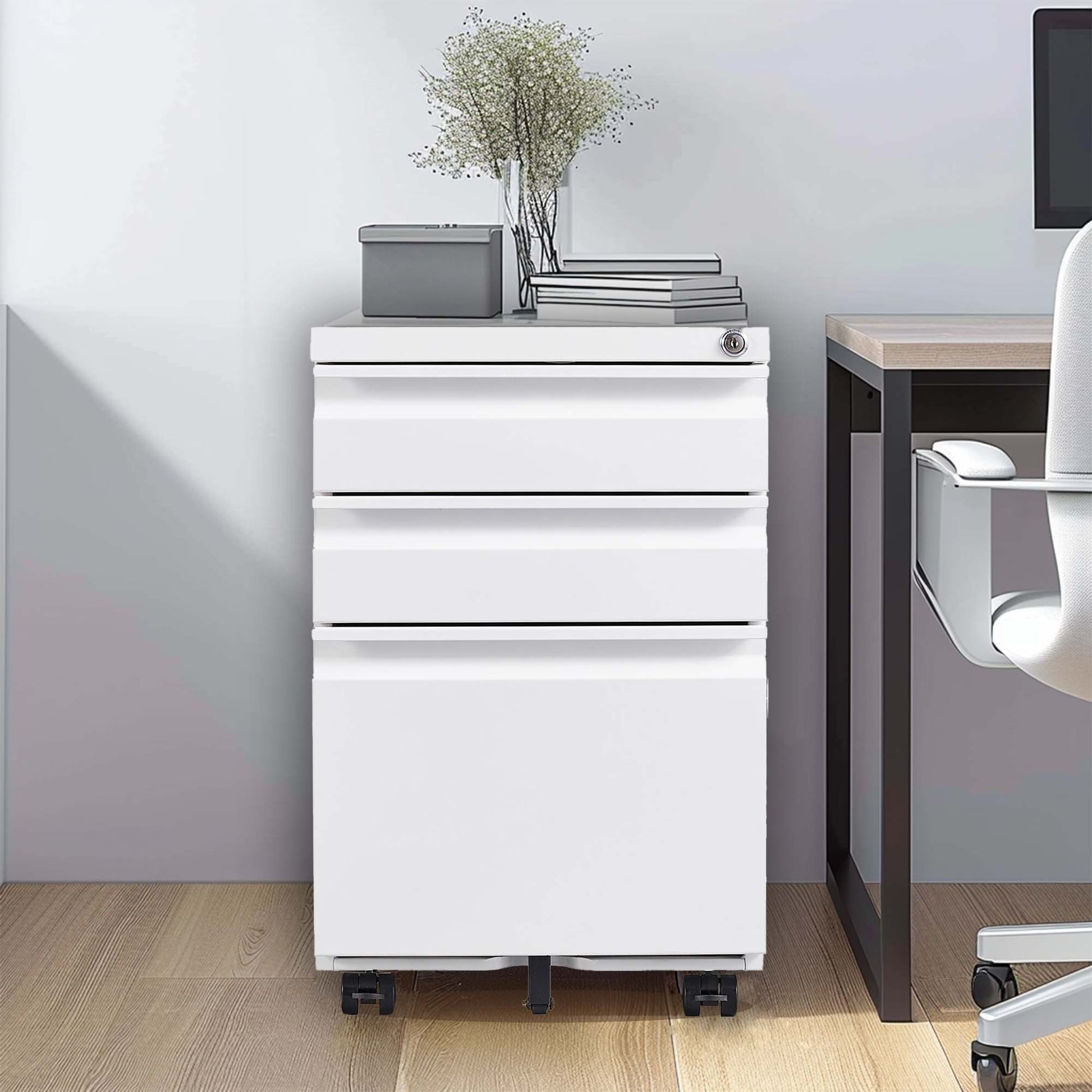 White metal mobile filing cabinet with three drawers and a lock