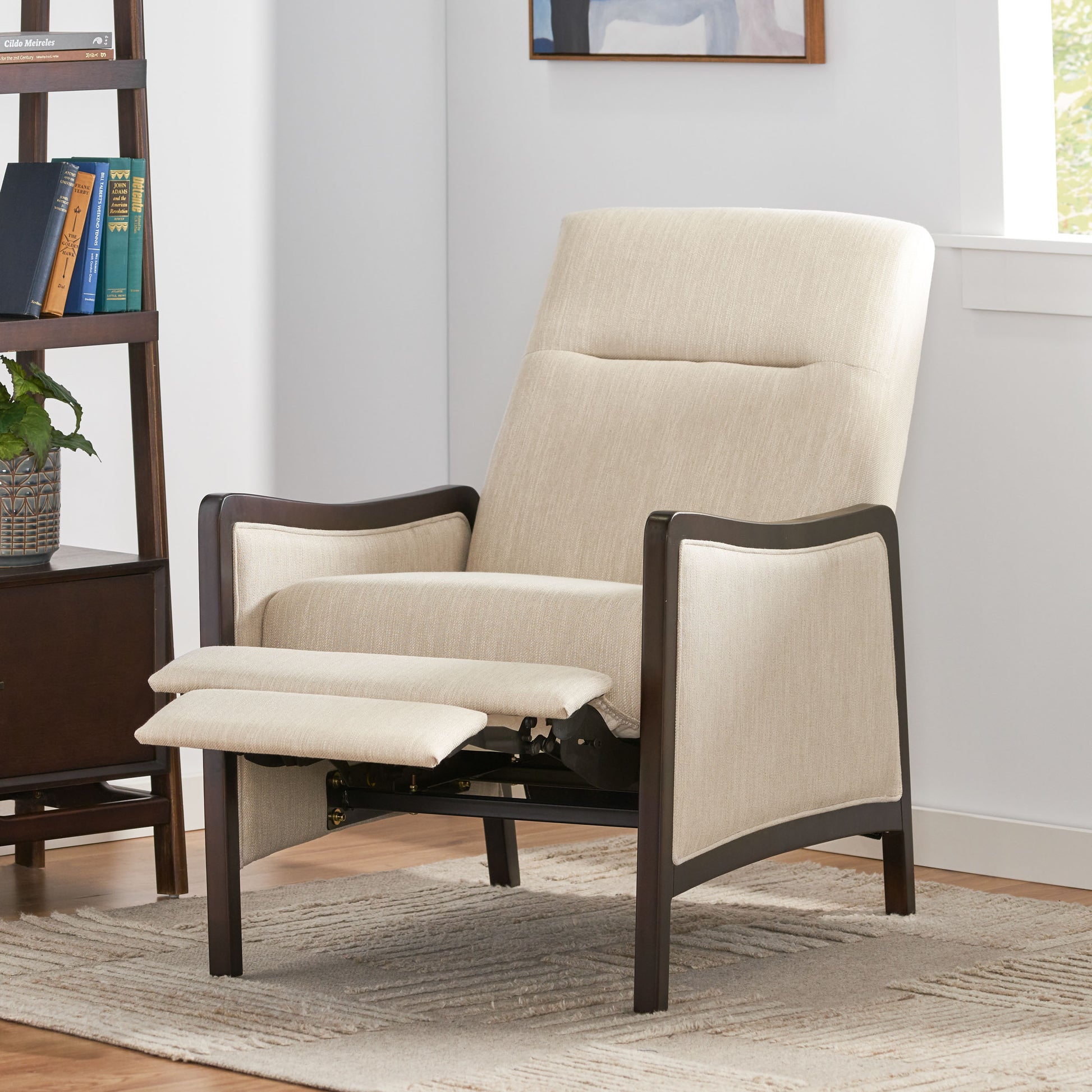 Light beige fabric recliner with dark wood frame and extended footrest perfect for living room relaxation