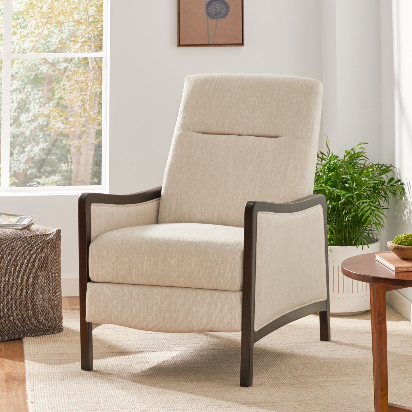 Tall linen armchair in cream with dark wood accents perfect for a modern living room