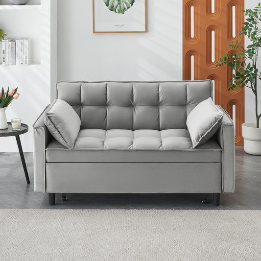 Grey tufted velvet sofa with two matching throw pillows perfect for small spaces