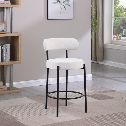 Modern white boucle fabric bar stool with black metal legs and footrest