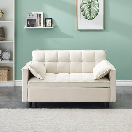 Cream velvet sofa with tufted cushions and two throw pillows perfect for modern living rooms