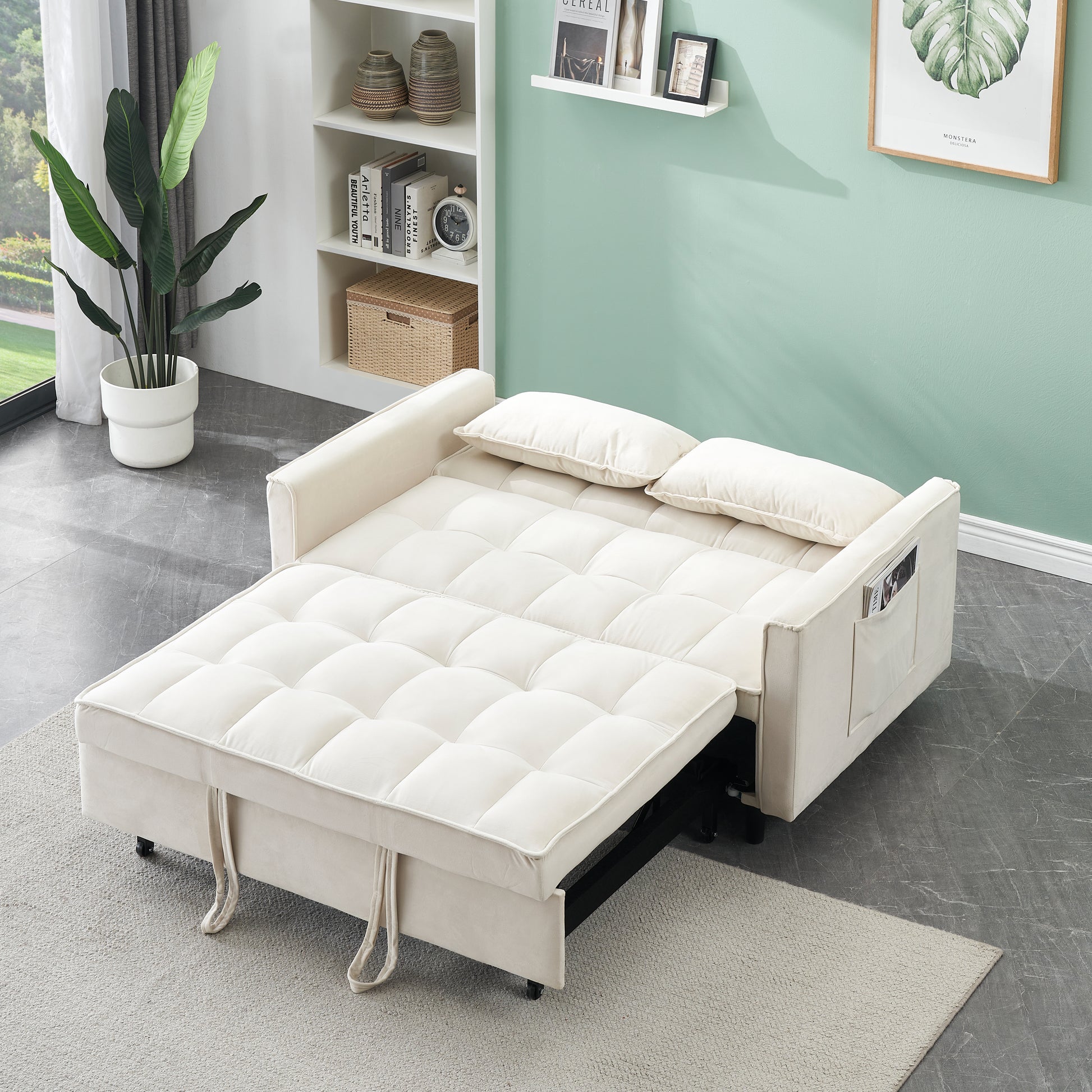 Cream upholstered sofa bed with pullout mattress and quilted cushions modern living room furniture