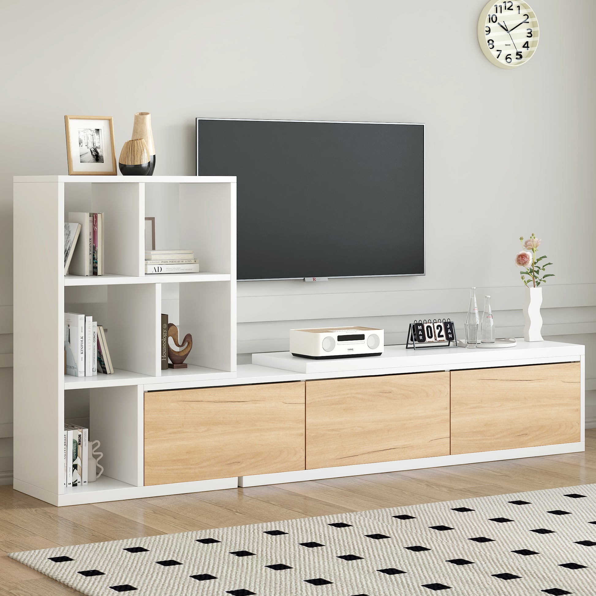 Modern white entertainment center with oak wood drawers and open shelving for media storage