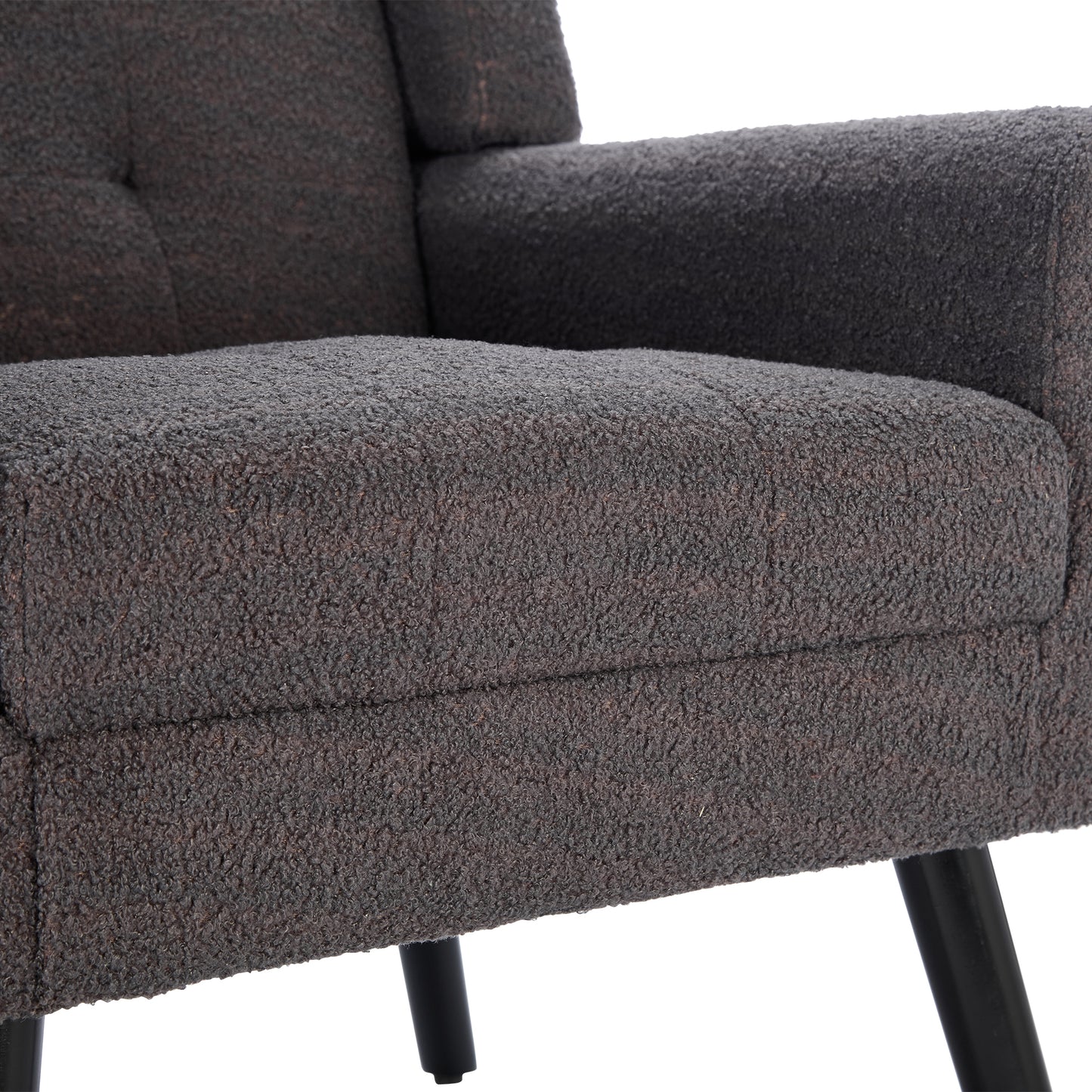 Textured charcoal boucle fabric armchair tufted back detail black tapered legs