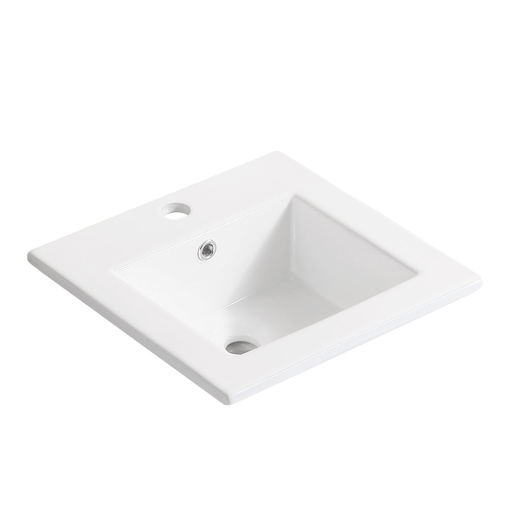 White ceramic undermount sink with single faucet hole and overflow drain