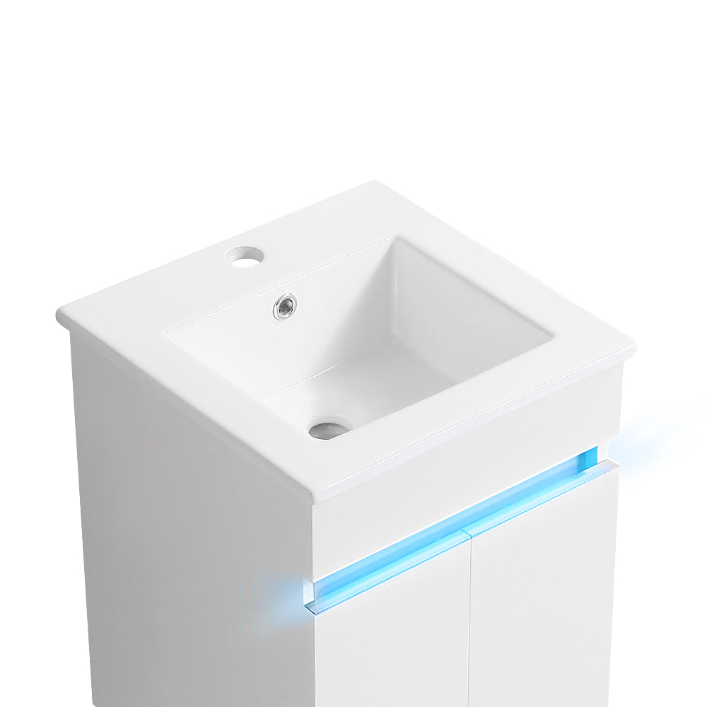 Modern white ceramic bathroom vanity sink with blue LED accent lighting