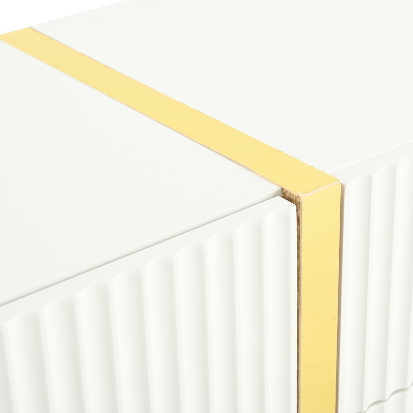White dresser with fluted drawers and gold accent trim modern design