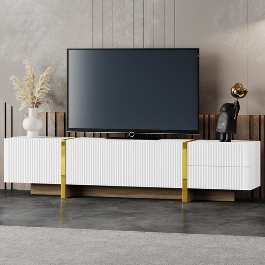 Modern white media console with gold accents and fluted doors perfect for living room storage