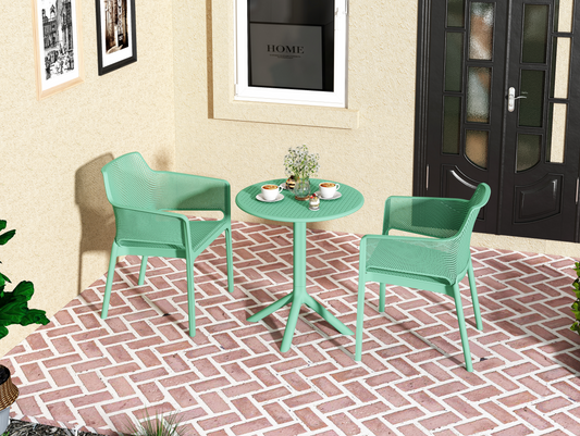Mint green modern outdoor chair with perforated seat and backrest perfect for patio use