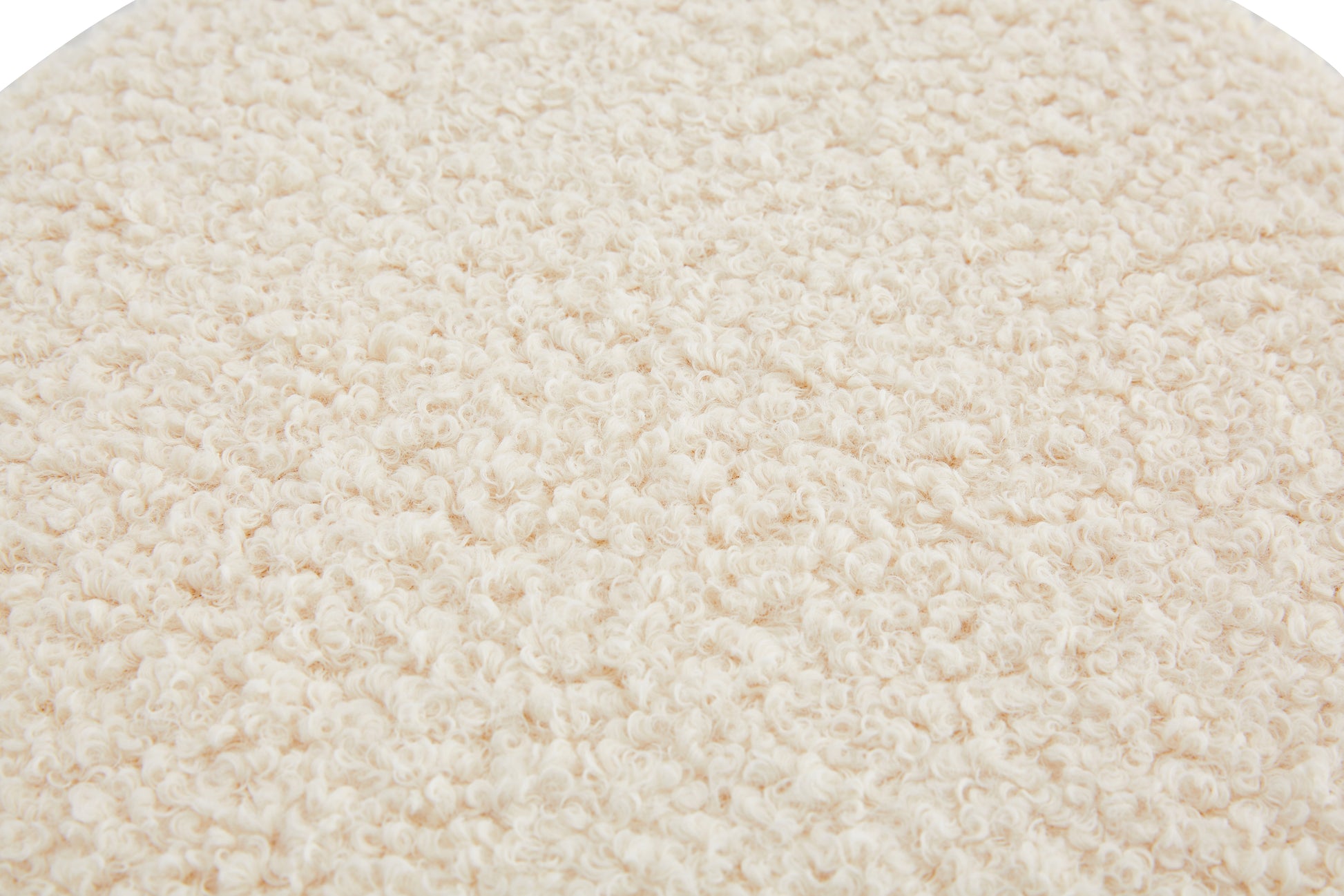 Textured cream boucle fabric closeup ideal for upholstery