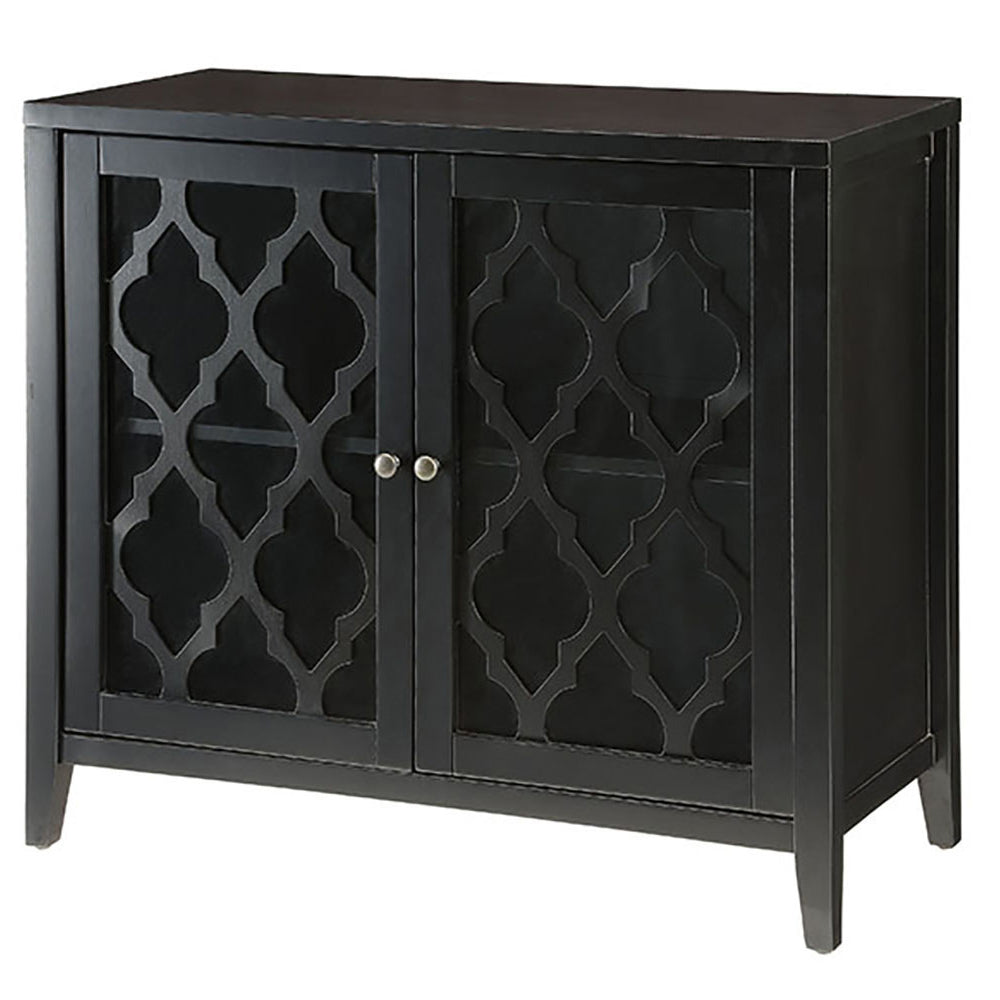Black cabinet with ornate quatrefoil door fronts and silver knobs