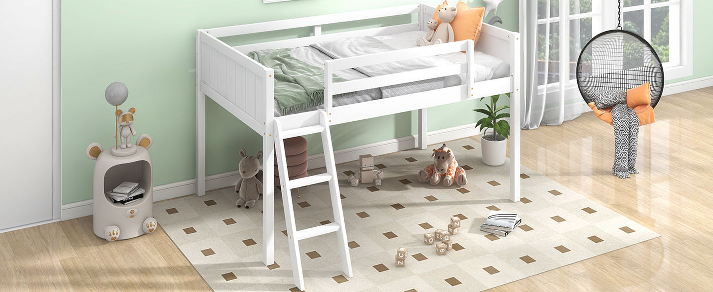 White wooden loft bed with green blanket and plush toys