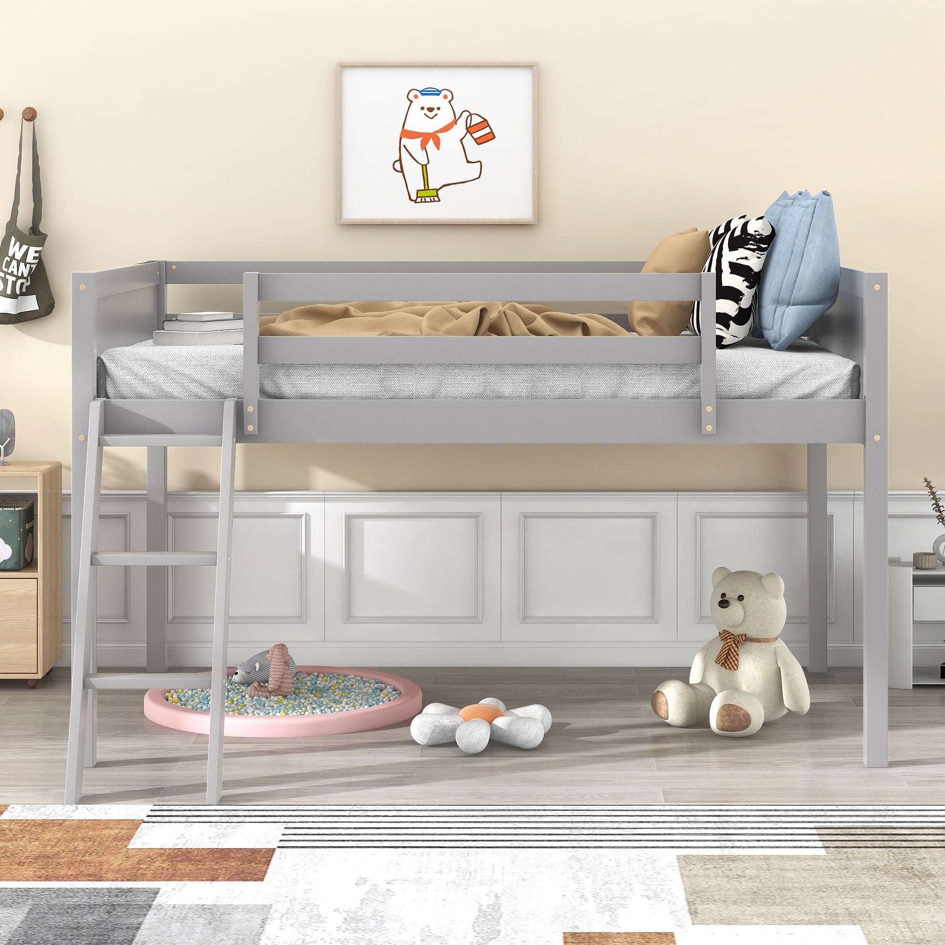 Gray wooden loft bed with ladder and bedding