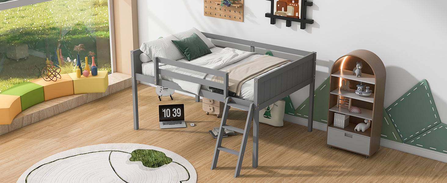 Gray wooden loft bed with white linens and green accent pillow
