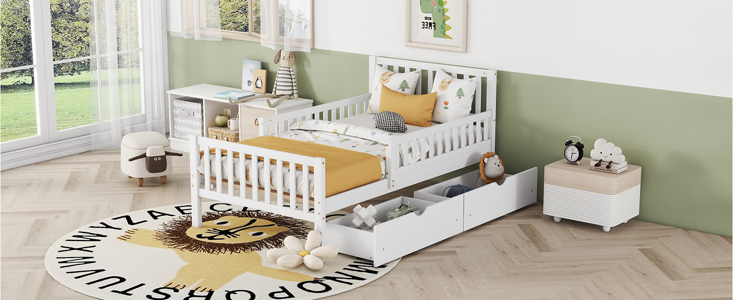 White wooden toddler bed with playful animal bedding and storage drawers