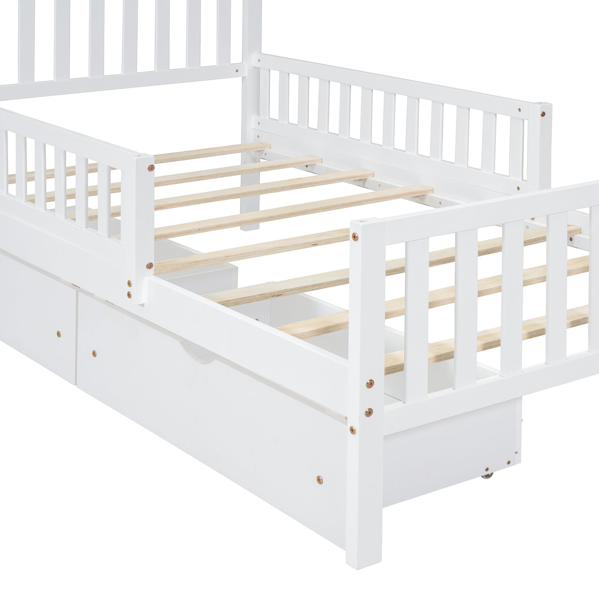 White wooden toddler bed frame with safety rails and underbed storage drawers