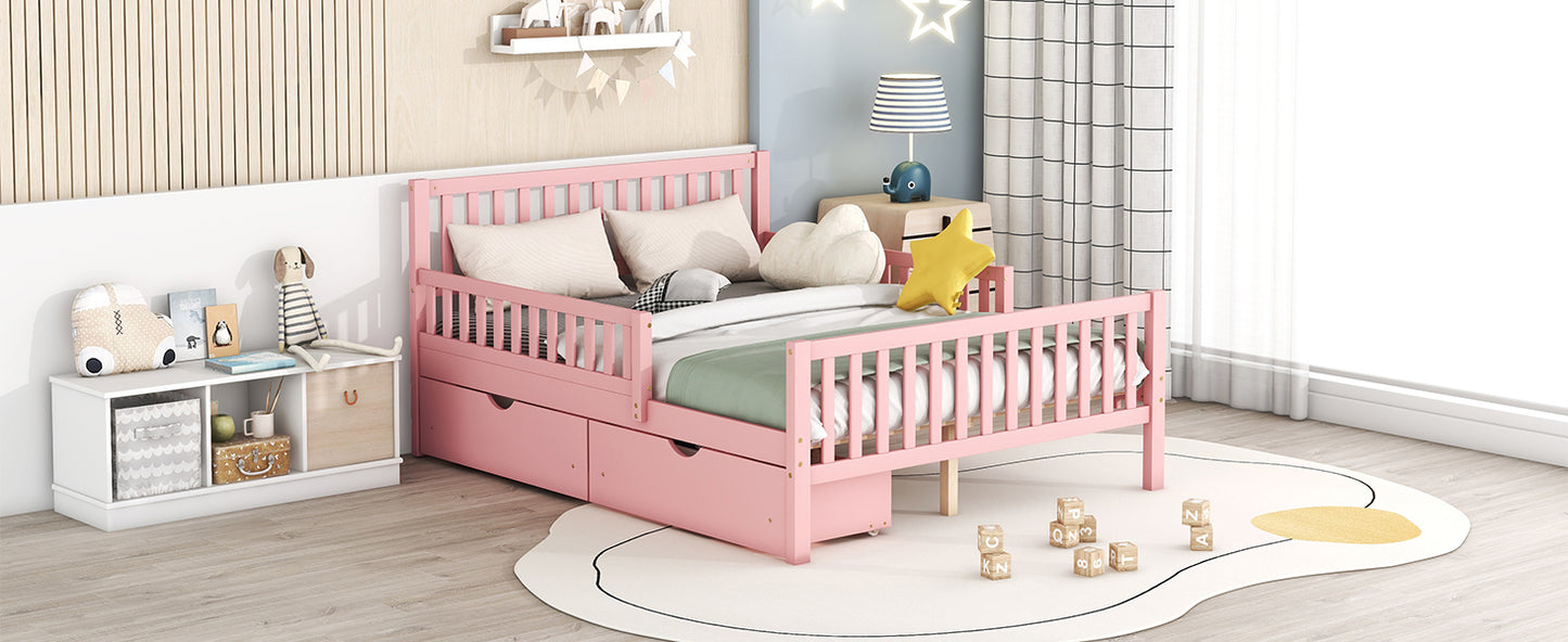Pink wooden toddler bed with drawers and guardrail