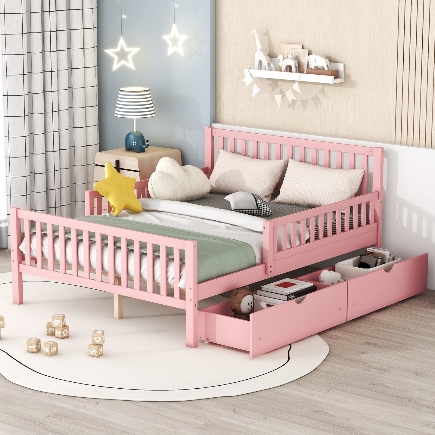 Pink wooden toddler bed with drawers and a crib mattress