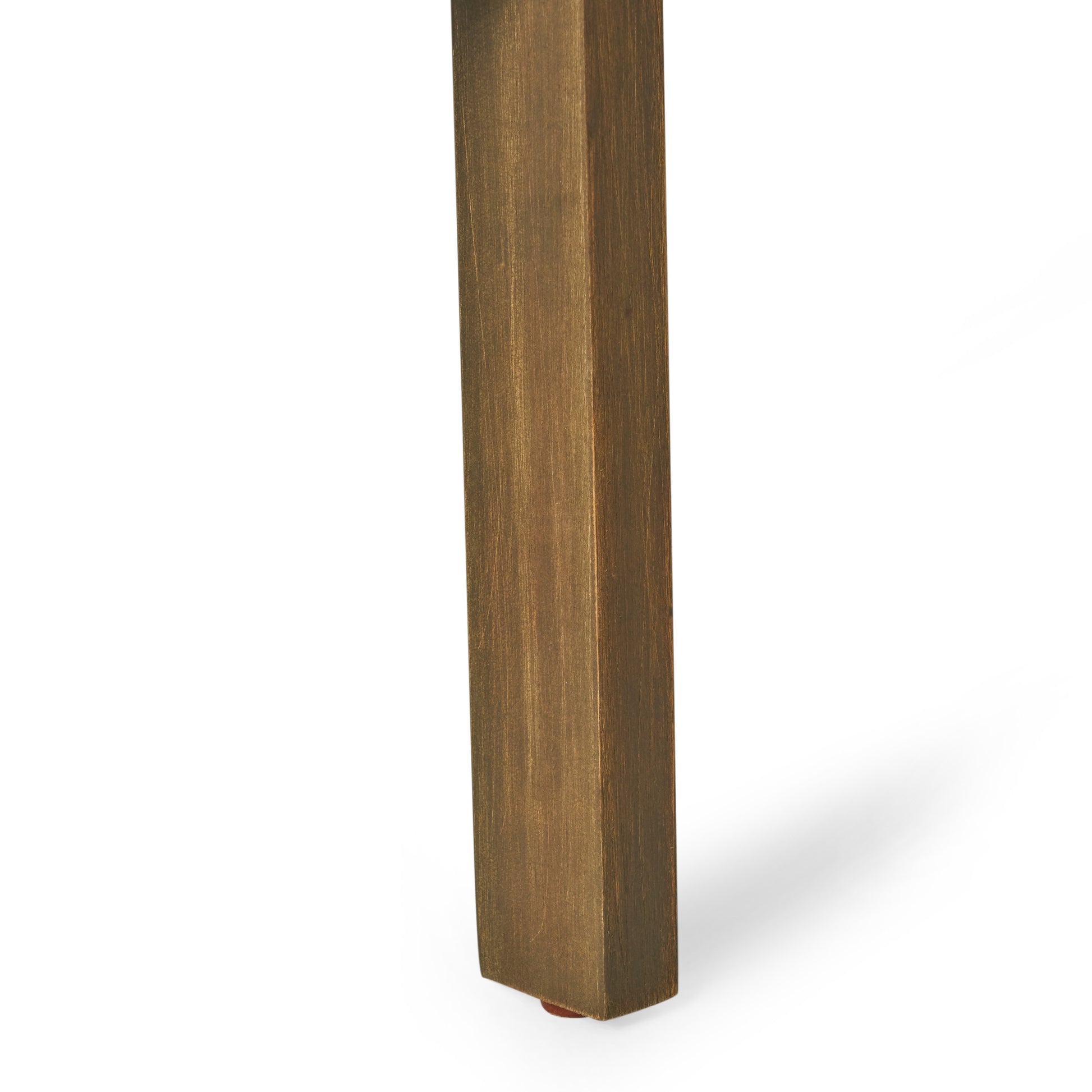 A closeup of a solid wood furniture leg showcasing its rich dark oak finish and natural grain details