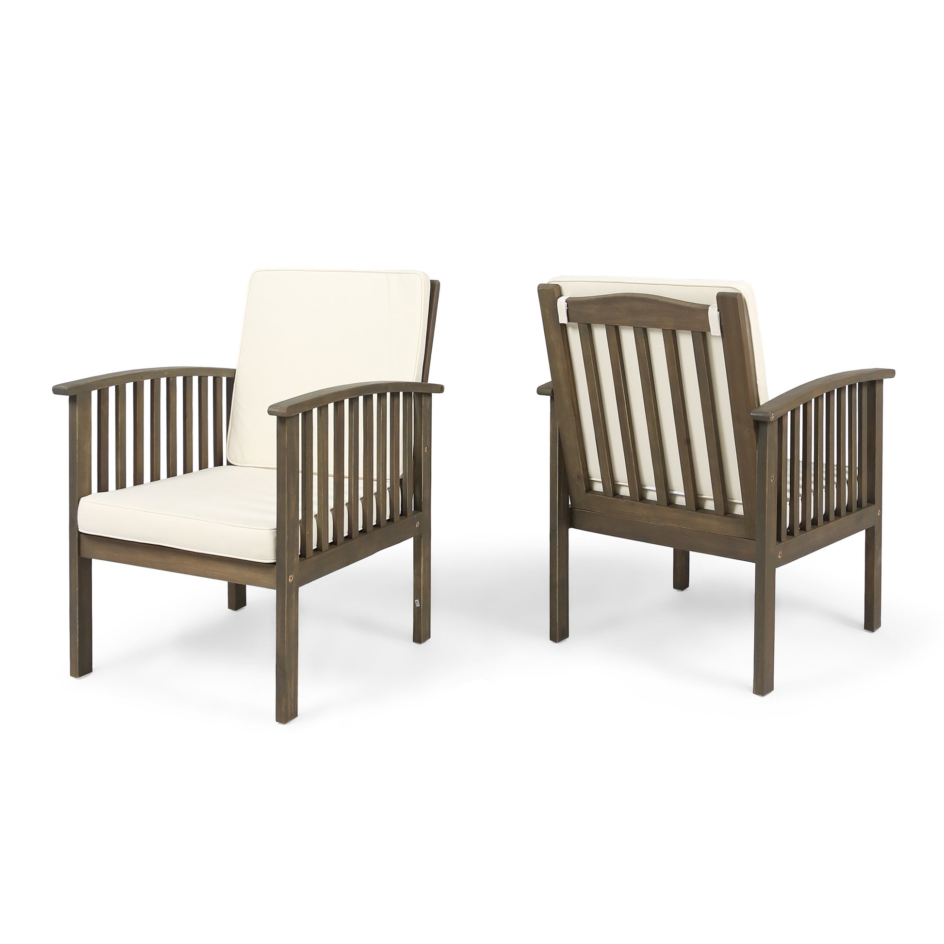 Dark wood patio armchair with cream cushions slatted back and arms