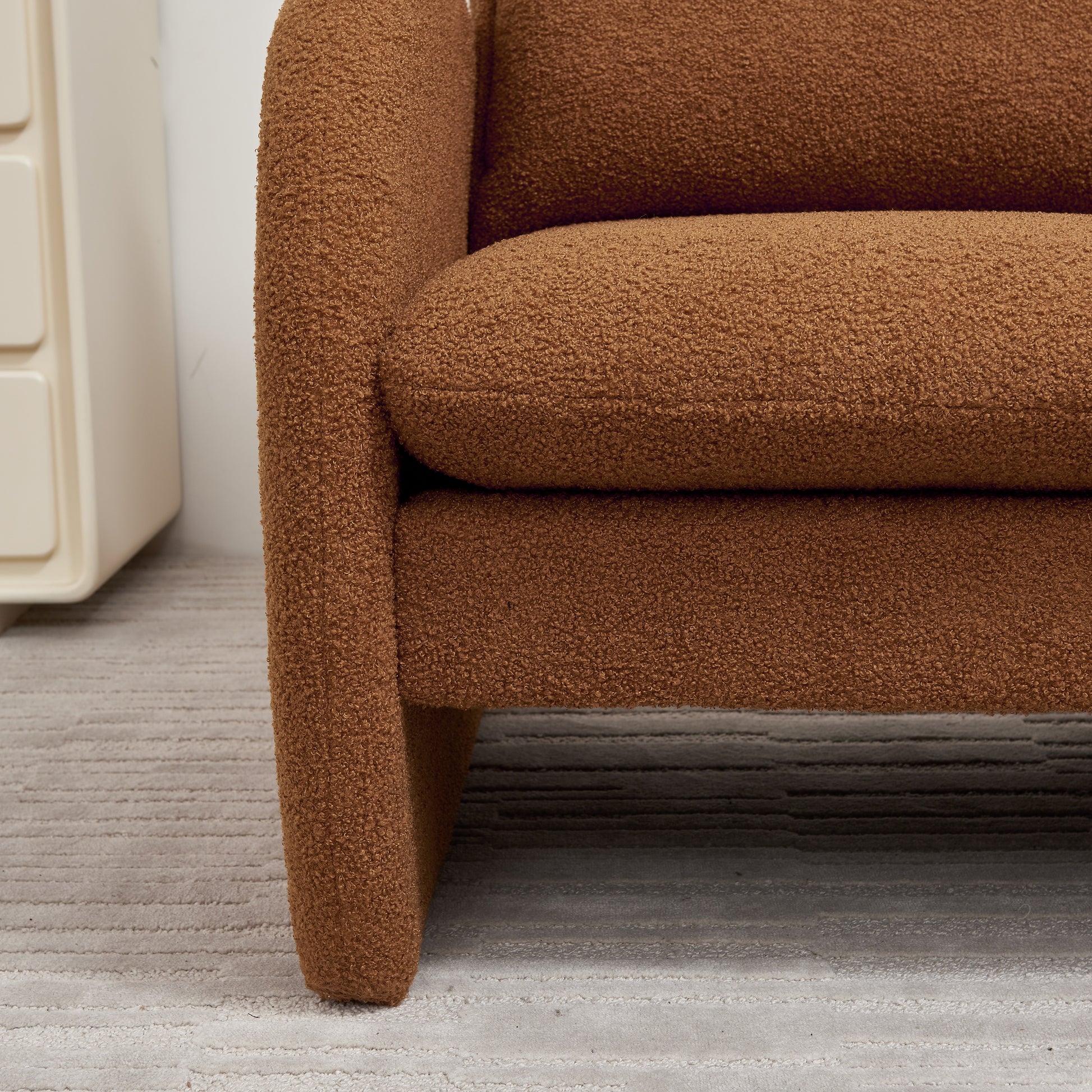 Cozy brown boucle armchair plush fabric for ultimate comfort and style