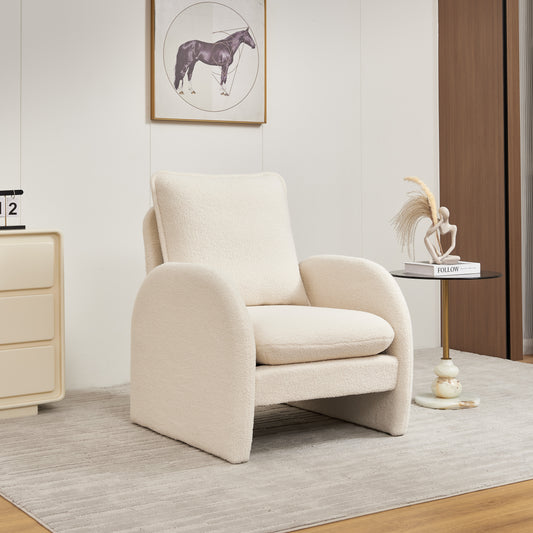 Plush cream boucle armchair with curved arms perfect for a cozy living room accent chair
